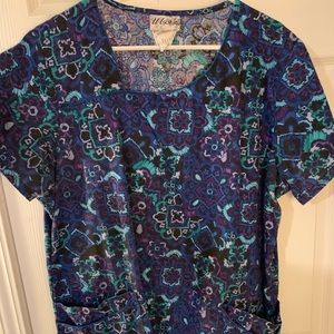 Navy blue patterned scrub top